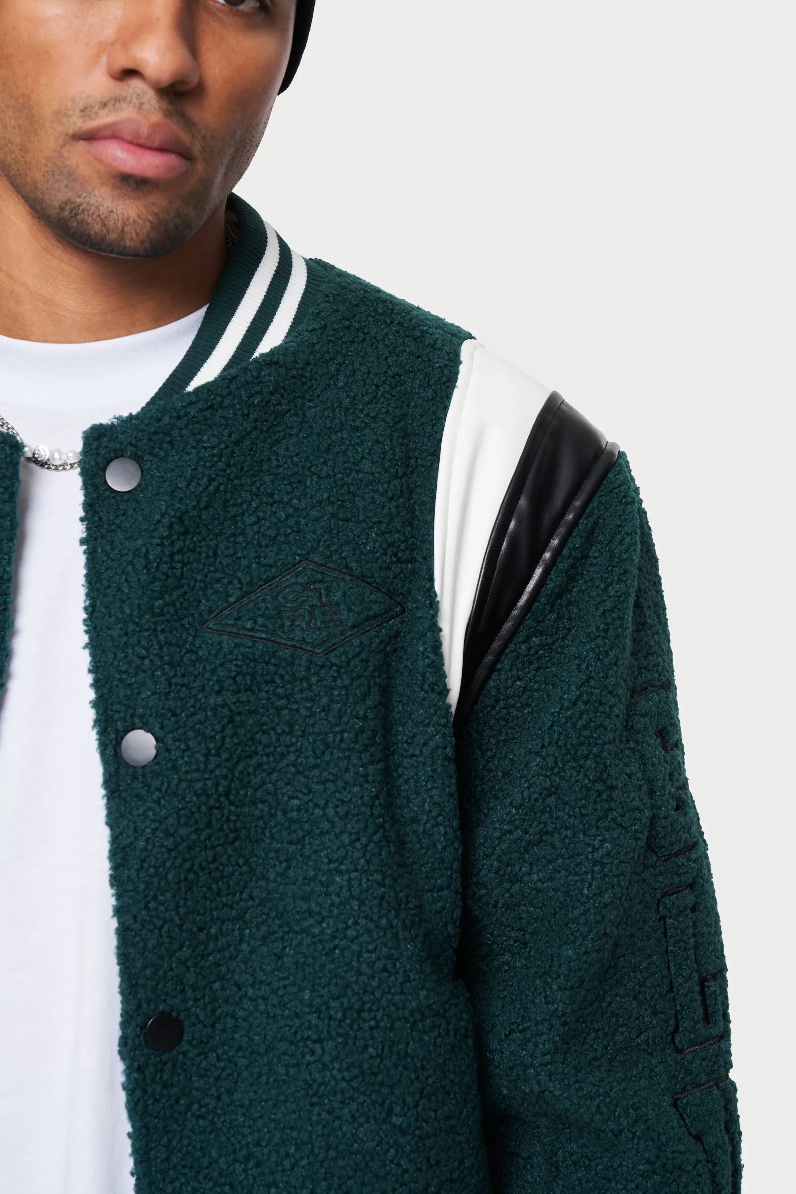 BADGED BORG VARSITY JACKET - GREEN