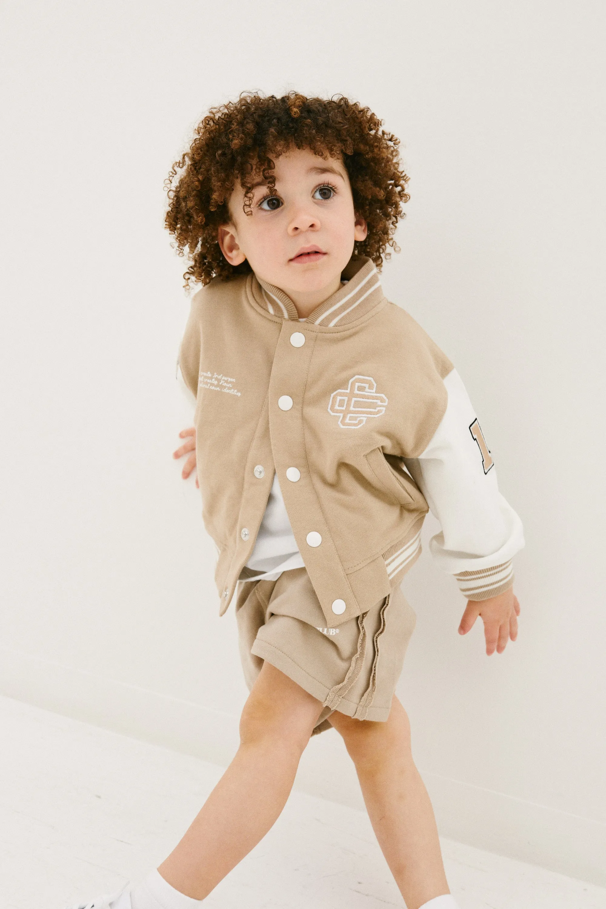 KIDS EMBLEM VARSITY BOMBER JACKET - BEIGE