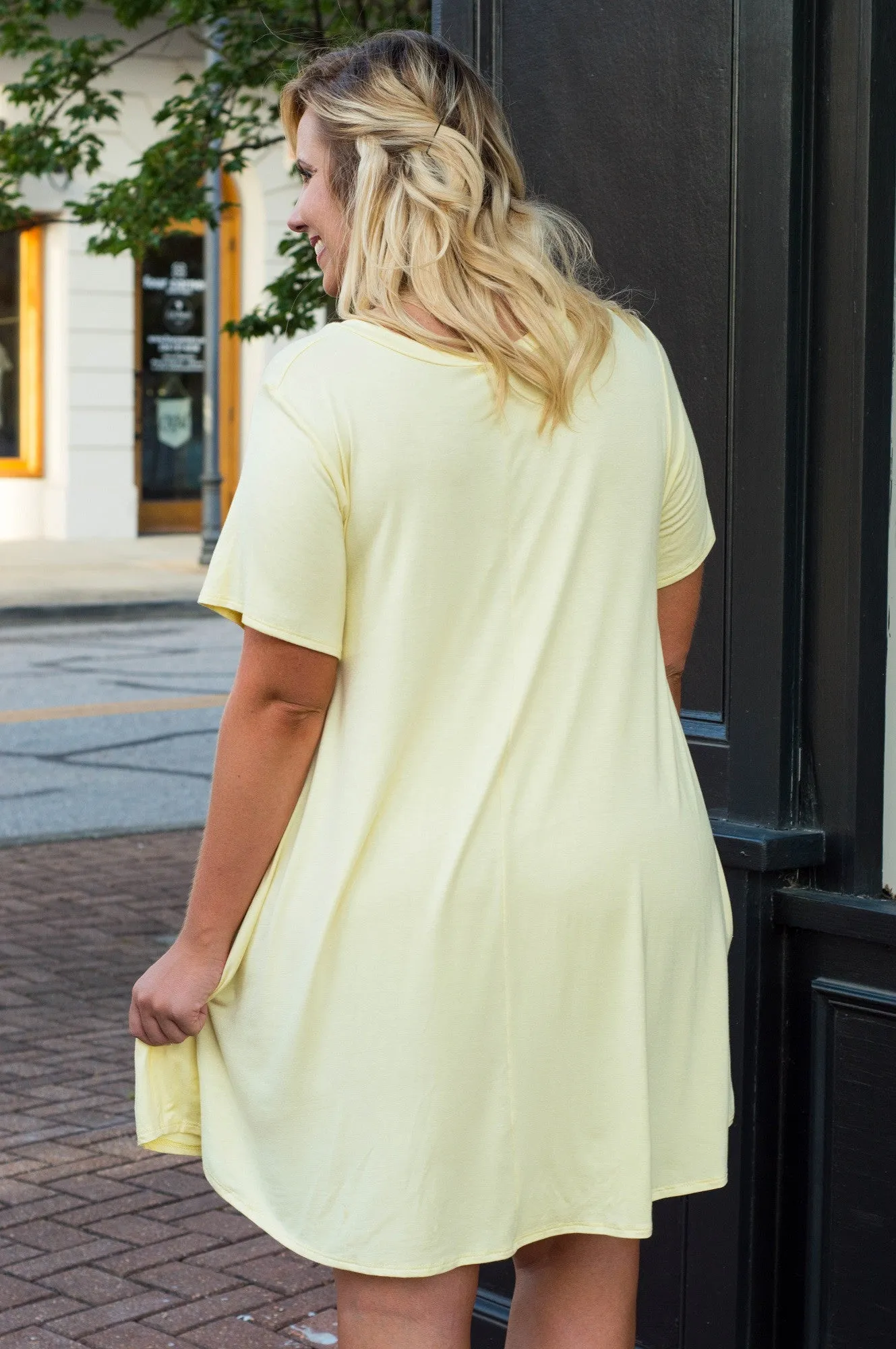 The Ellie Dress, Lemon could be rewritten as Lemon Ellie Dress - Stylish and Trendy Fashion Choice for better Google SEO optimiz