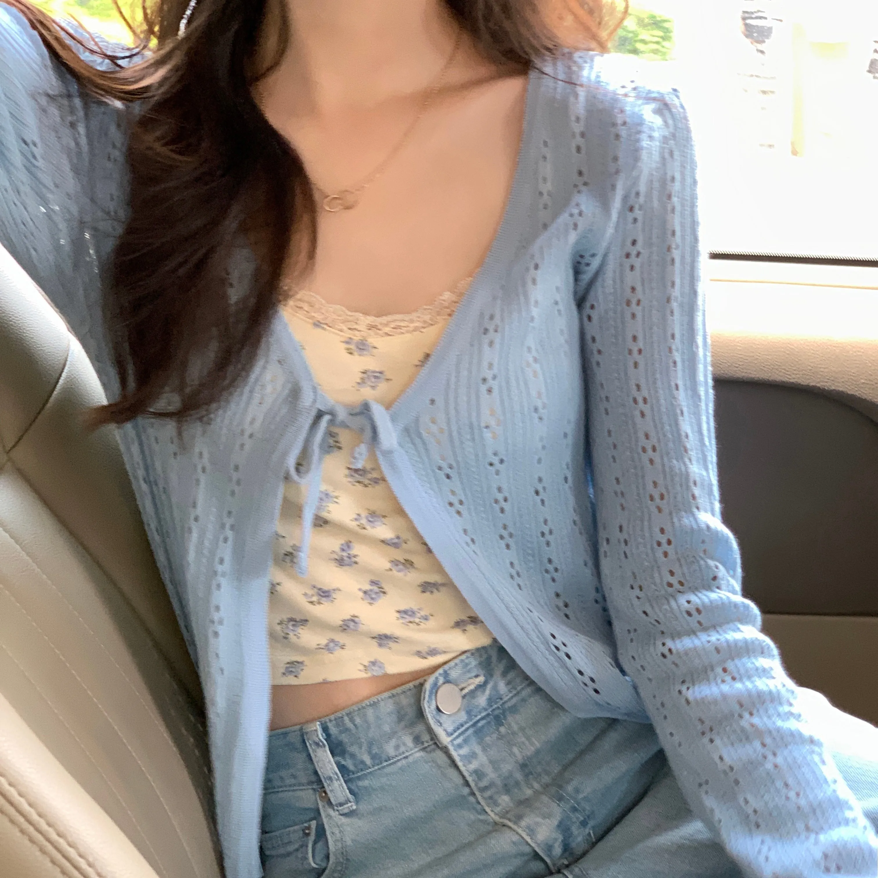 The optimized title result for Knit Tied Cardigan for better search engine optimization is Tie-Waist Knitted Cardigan - Shop now