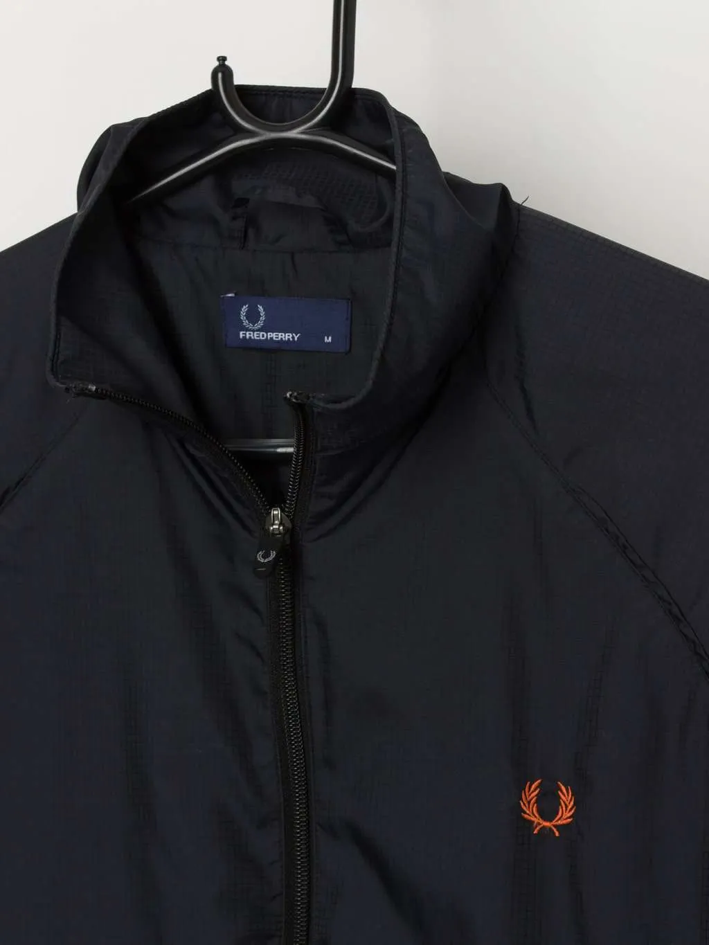 Vintage Fred Perry windbreaker jacket in navy and orange – Medium