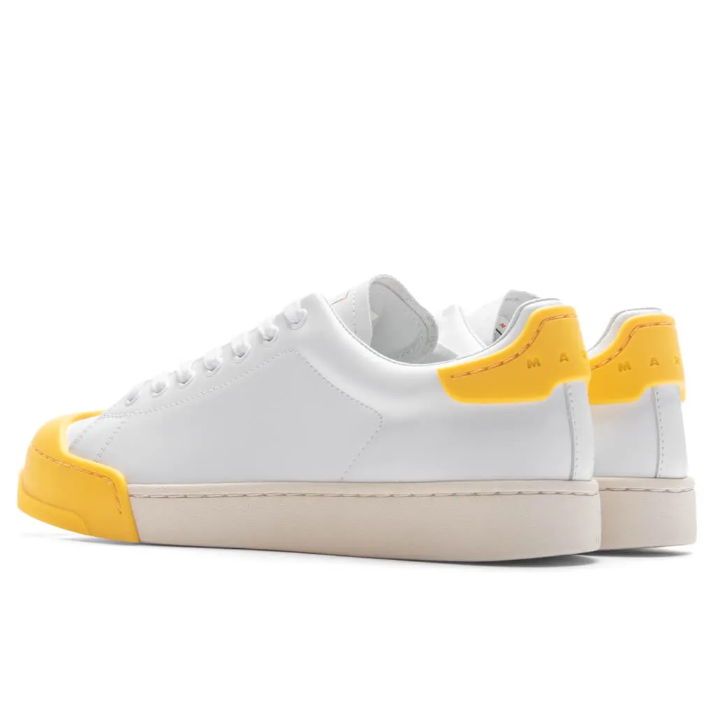 White and Yellow Leather Sneakers.